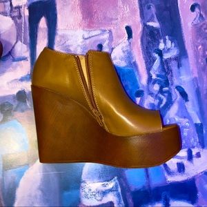 Brown platform zip heels